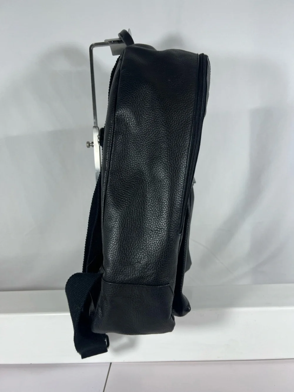 4063: Cole Haan Black Pebbled Leather Backpack